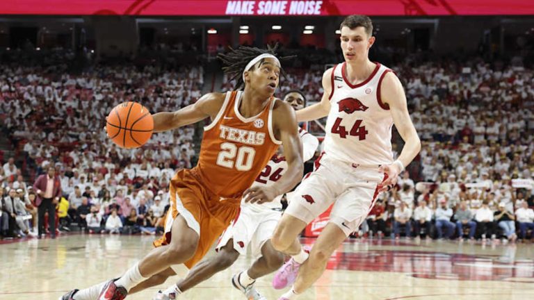 Tre Johnson Shines as Texas Longhorns Drop OT Heartbreaker to Arkansas